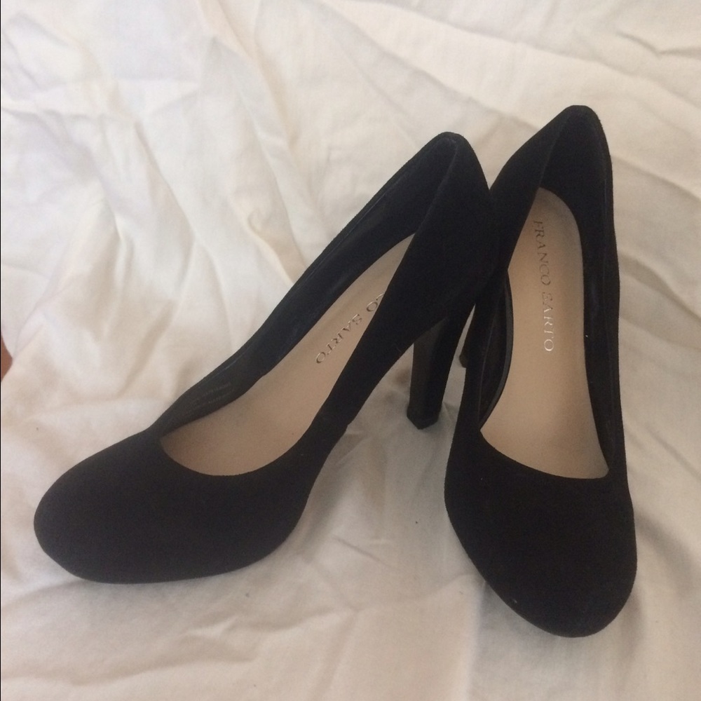 Black suede pumps.