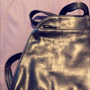 Black sleek purse/ backpack style purse