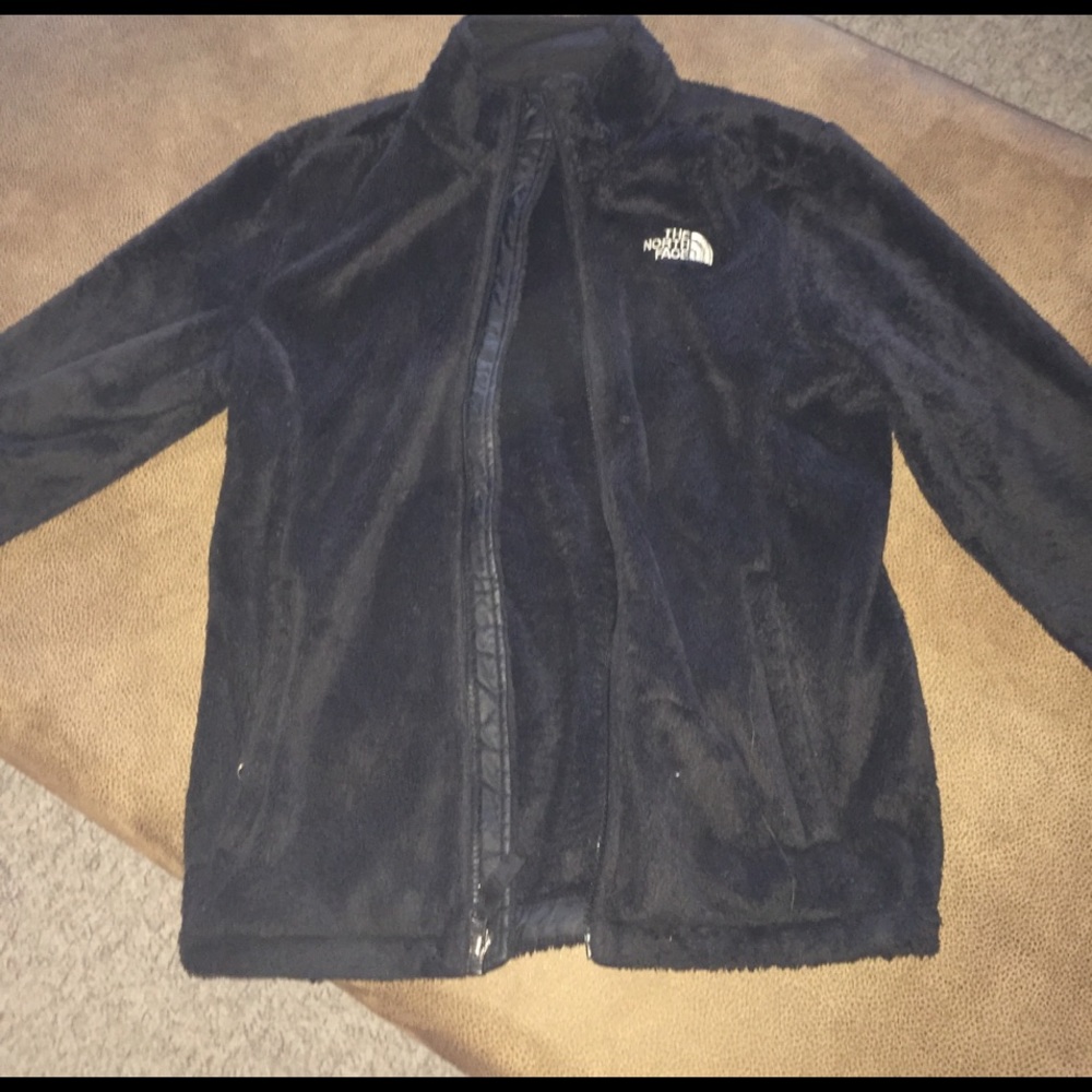 Black fuzzy north face jacket