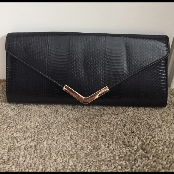 Aldo Handbags - ALDO black clutch. ***NEVER USED***