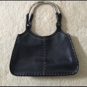 Black leather purse w/ tan piping /silver handles