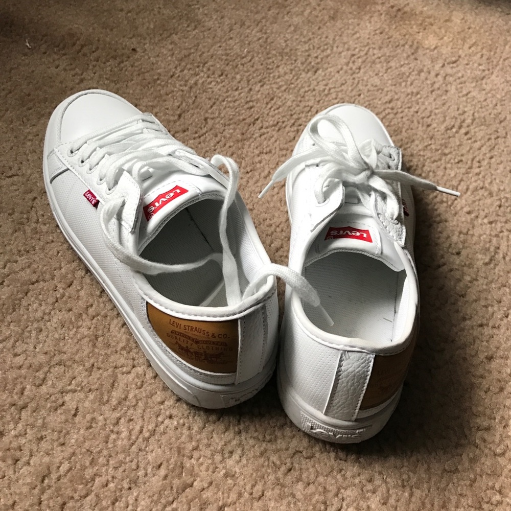 White Levi tennis shoes