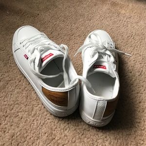 White Levi tennis shoes