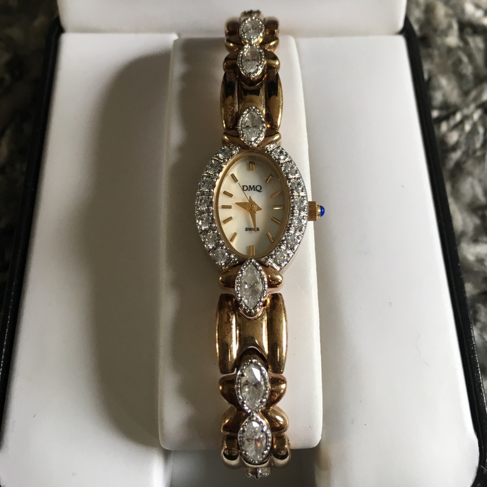 DMQ gold and crystal watch with box