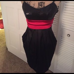 Cocktail dress Sequined top with satin bottom.