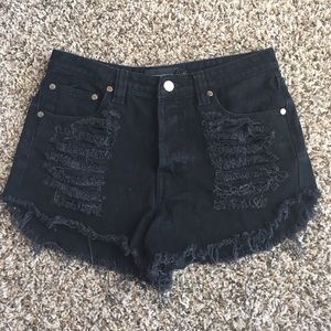 Mink pink ripped black denim shorts