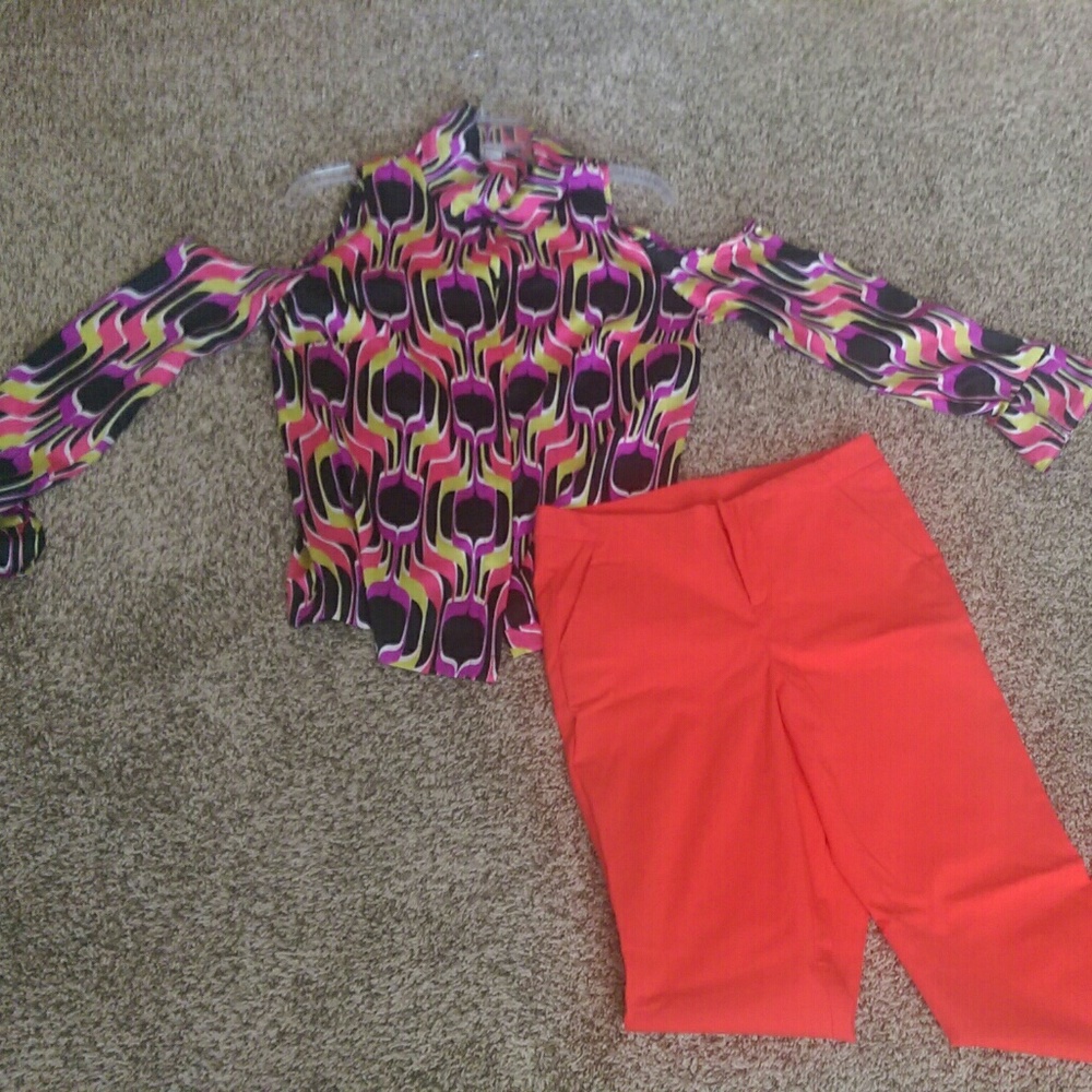 Bright and colorful cold shoulder button up shirt.