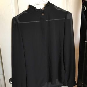 Super cute button up ruffle neck blouse!