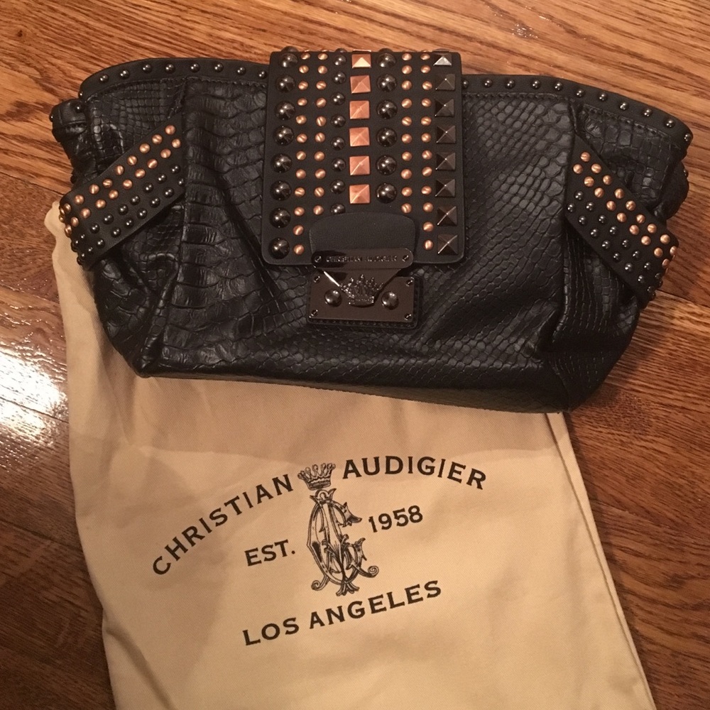 LIKE NEW black CHRISTIAN AUDIGIER clutch w/metal!!