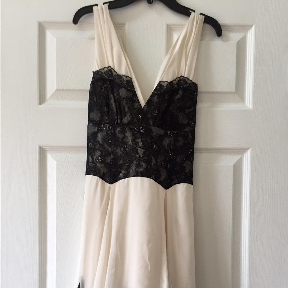Bebe creme and black dress