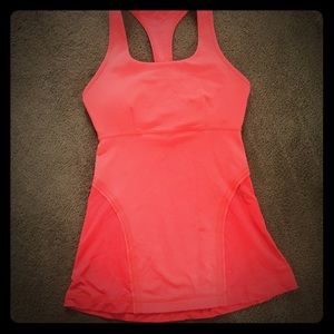 LuLulemon- orange/salmon size four racerback tank