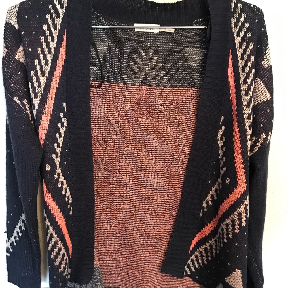 Francesca's blue cardigan