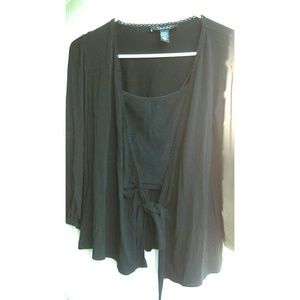 Super cute cardigan! Goes to elbow length
