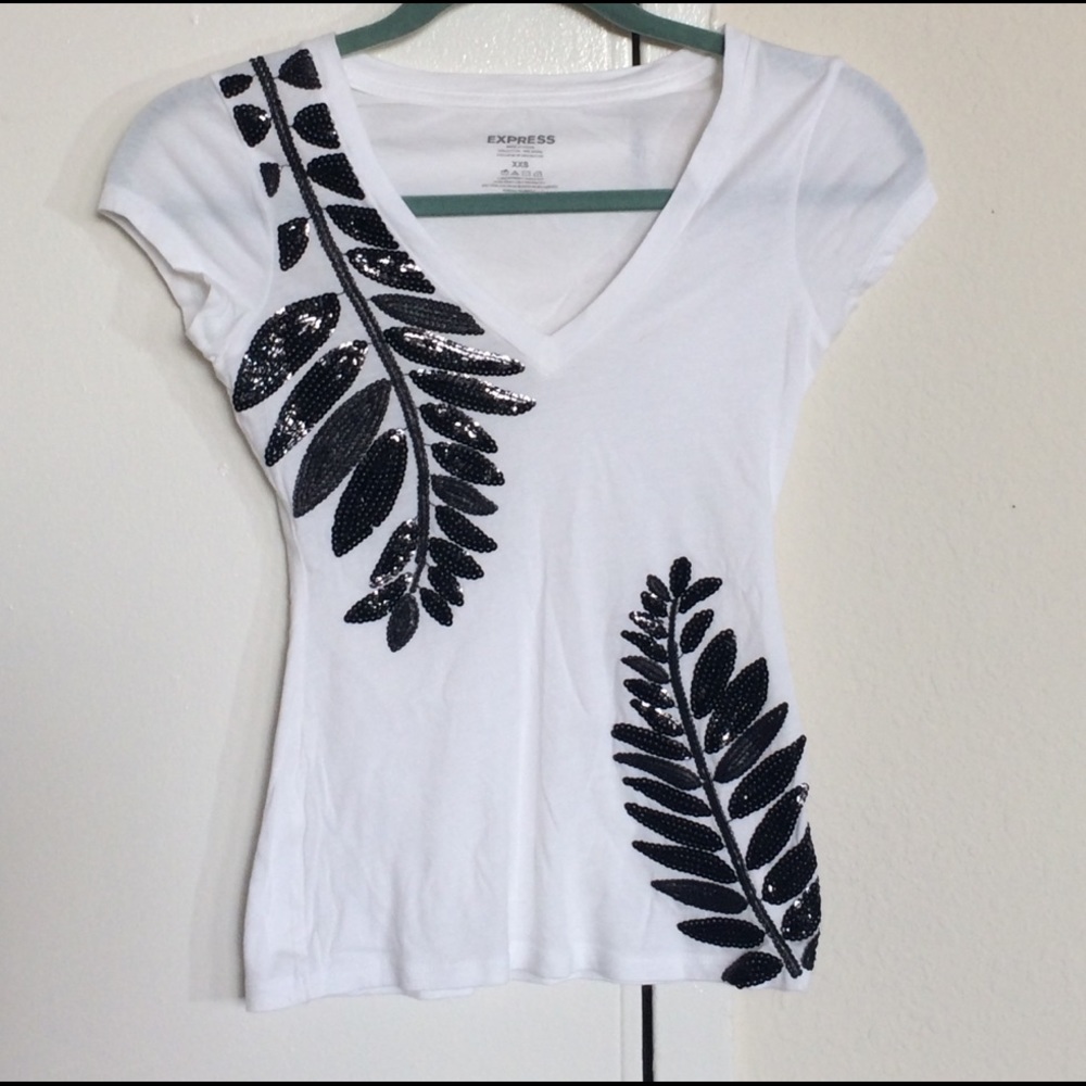White tee shirt with black sequin detail