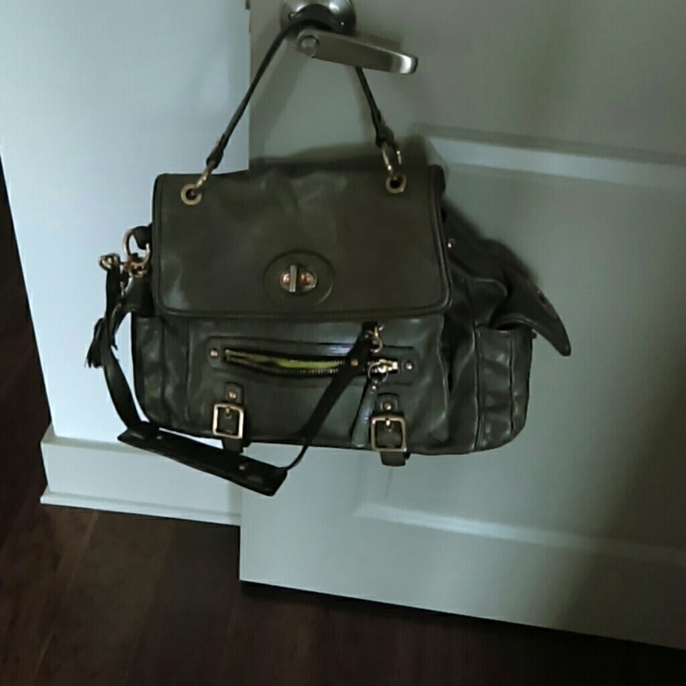Light  green with gold buckle shoulder traps bag