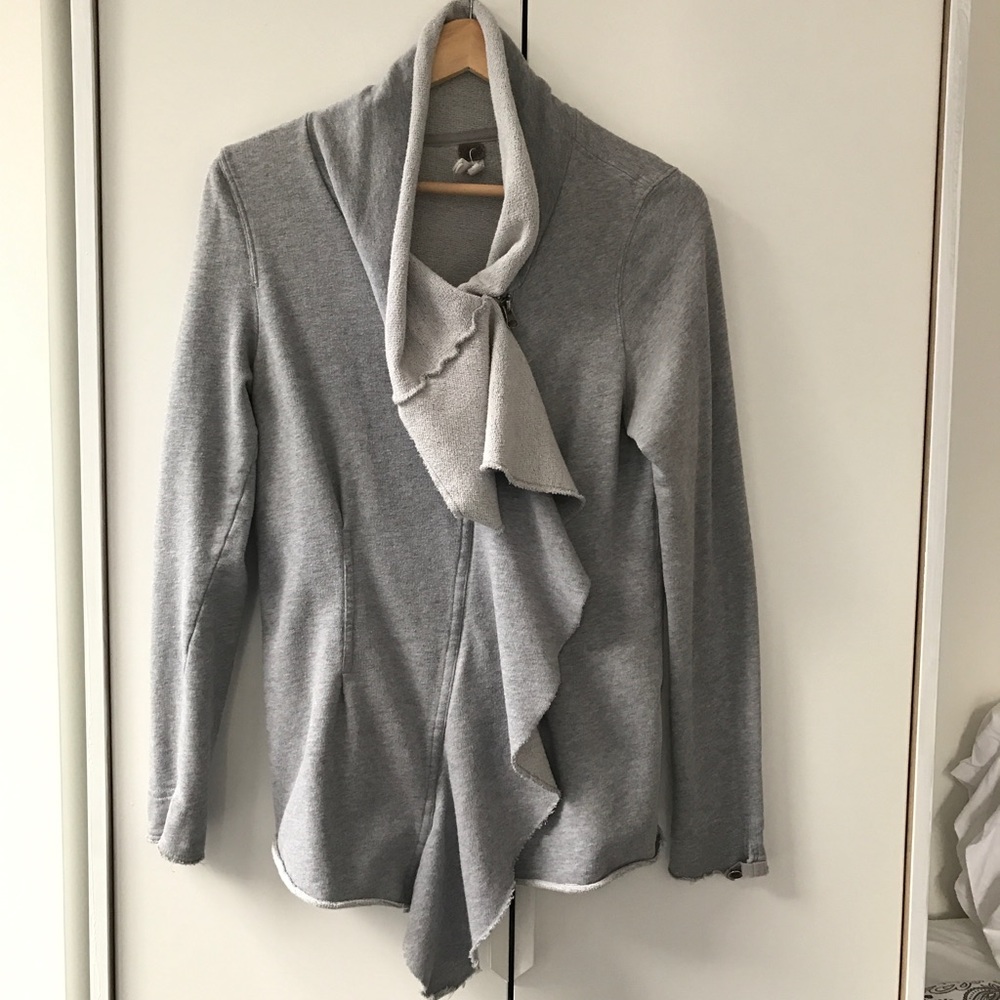 Free People Ruffled & Fitted Zip Up Sweatshirt.