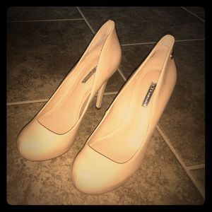 BCBG Generation tan leather platform heels.