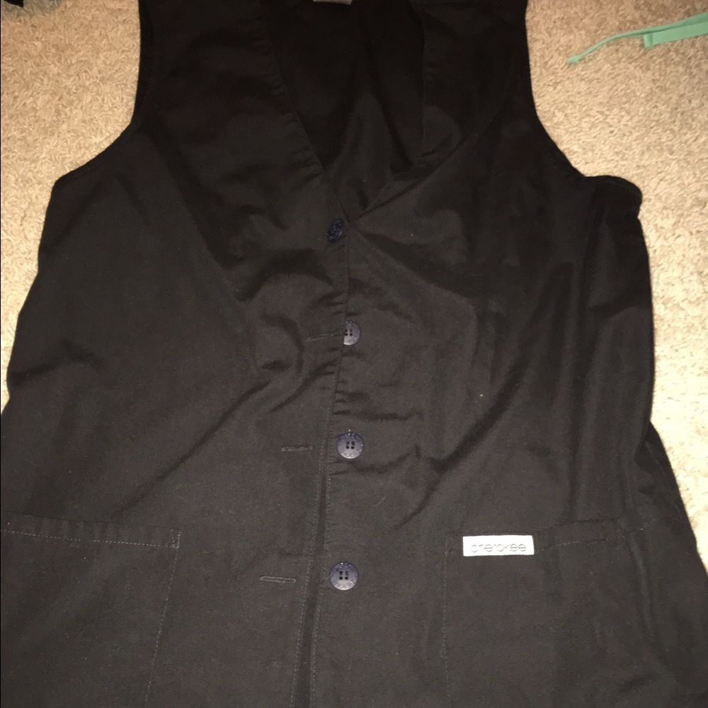 Scrub tops small & medium sizes.