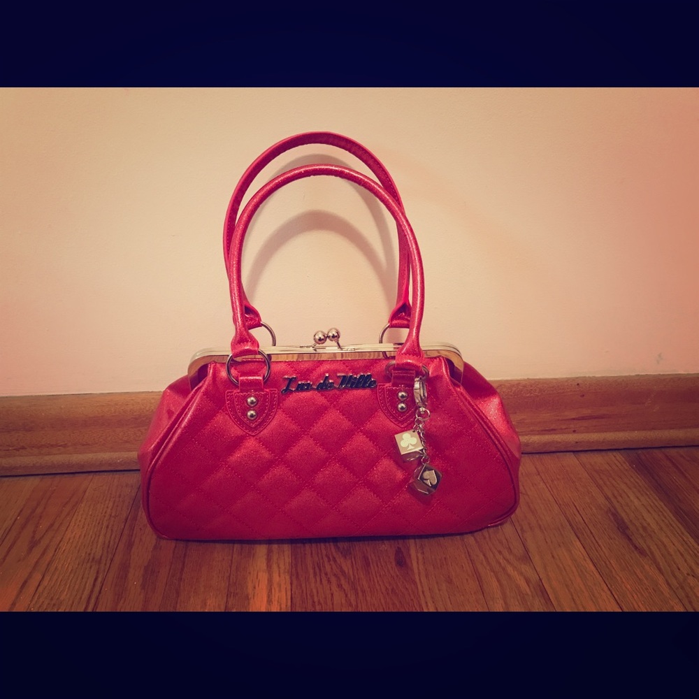 Red sparkle kiss-lock handbag