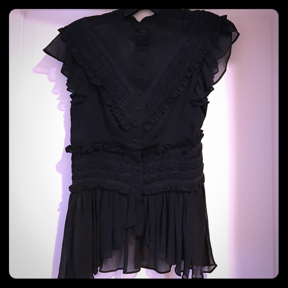 Beyoncé ‘s mom’s design- gorgeous fitted blouse