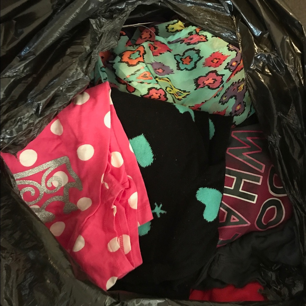 Bag of kids clothes some with tags
