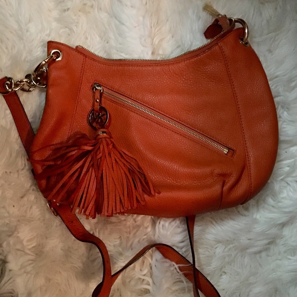 Michael Kors orange cross body leather bag