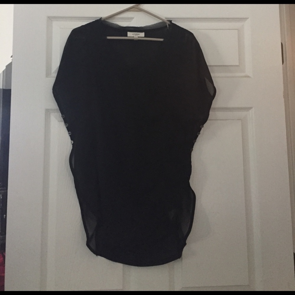 Black, figure flattering longer dress top.