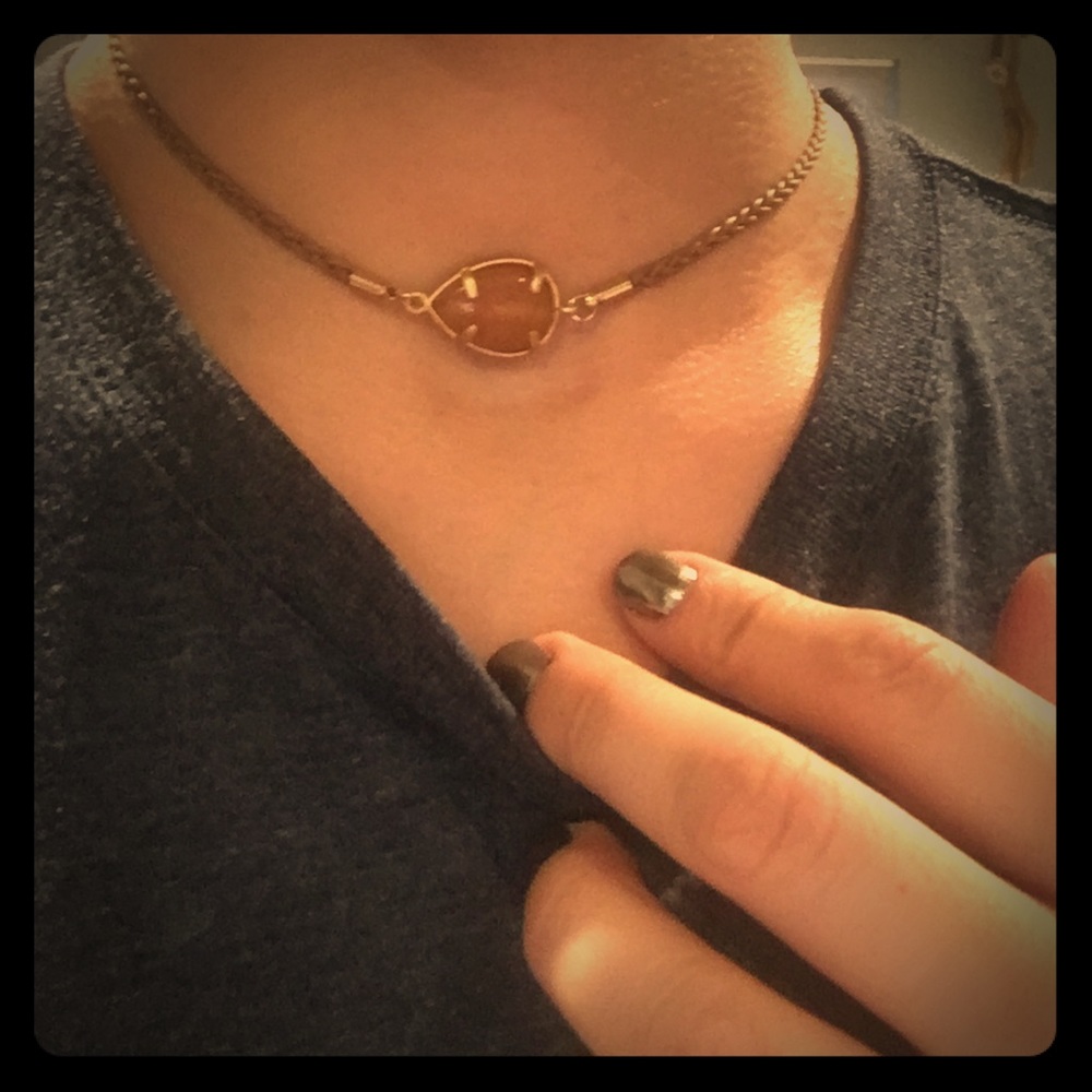 Orange stone dip gold set on brown braided leather
