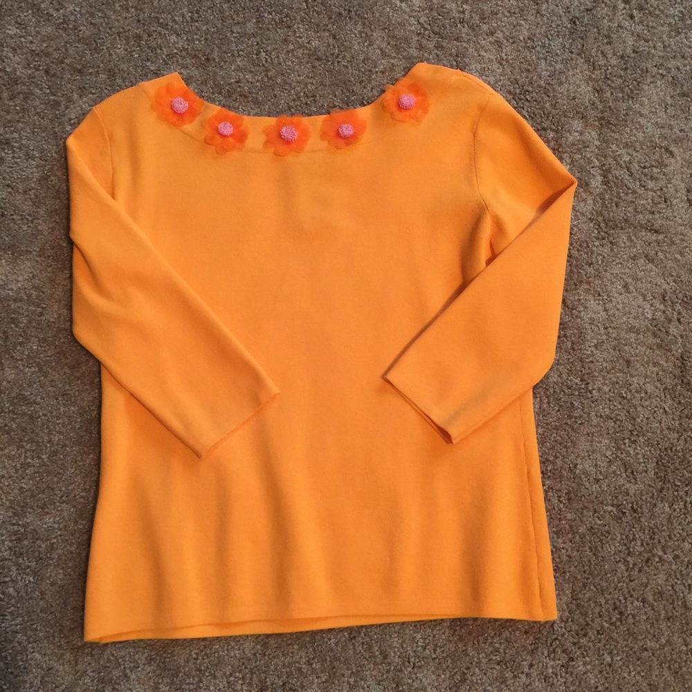 Lovely orange with flowers top