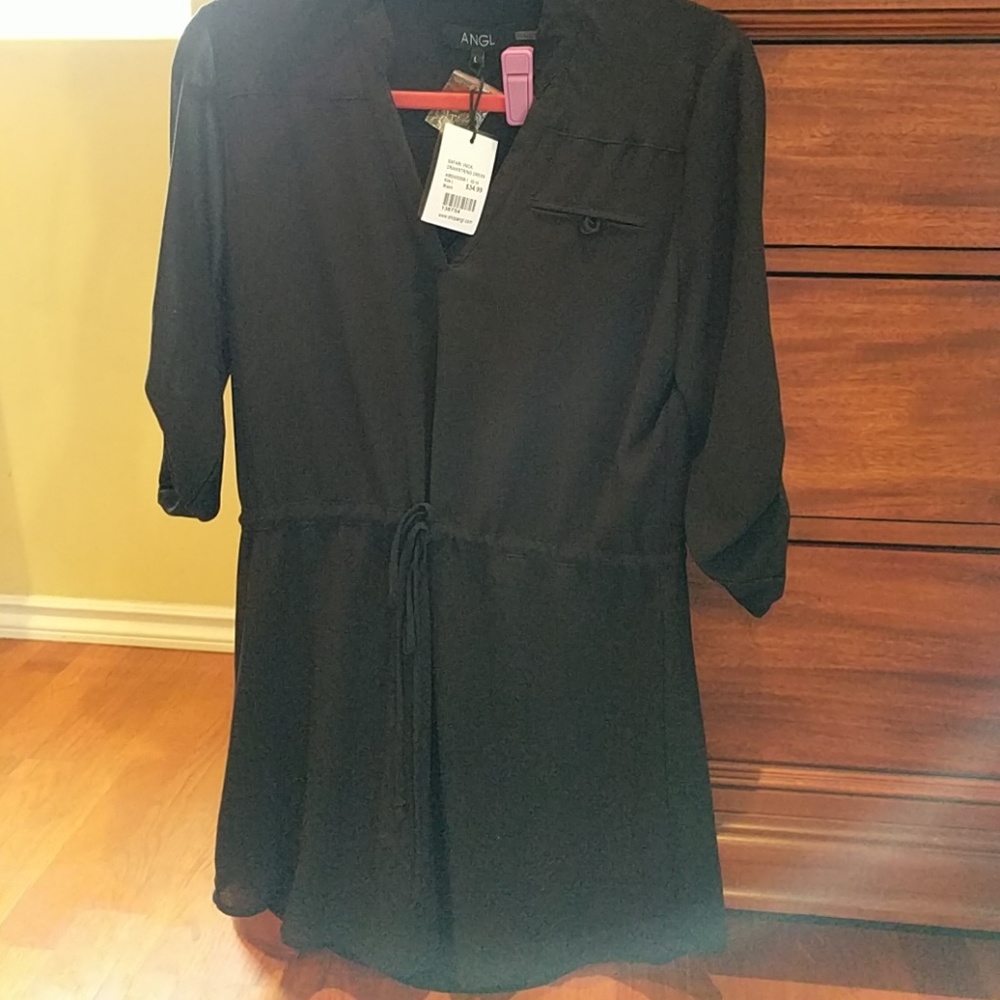 New with tags draw string mini black dress