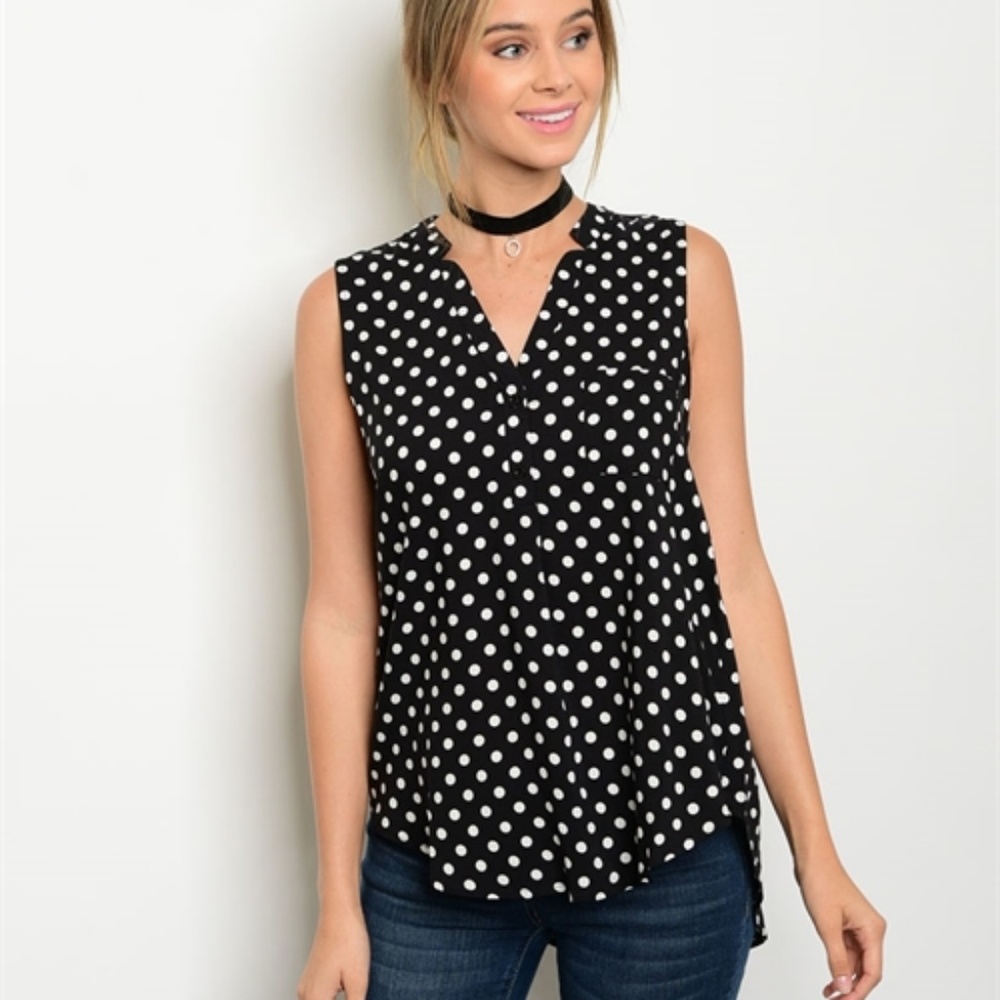 **HP 5/17/17** Black and ivory sleeveless top.