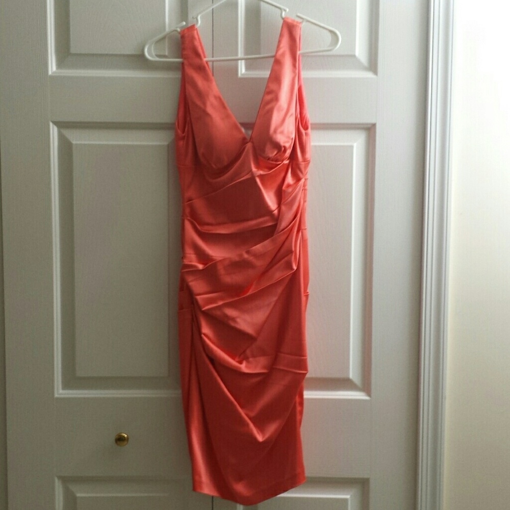Cache dress.. Made of 63% Acetate/ Nylon/ Spandex.