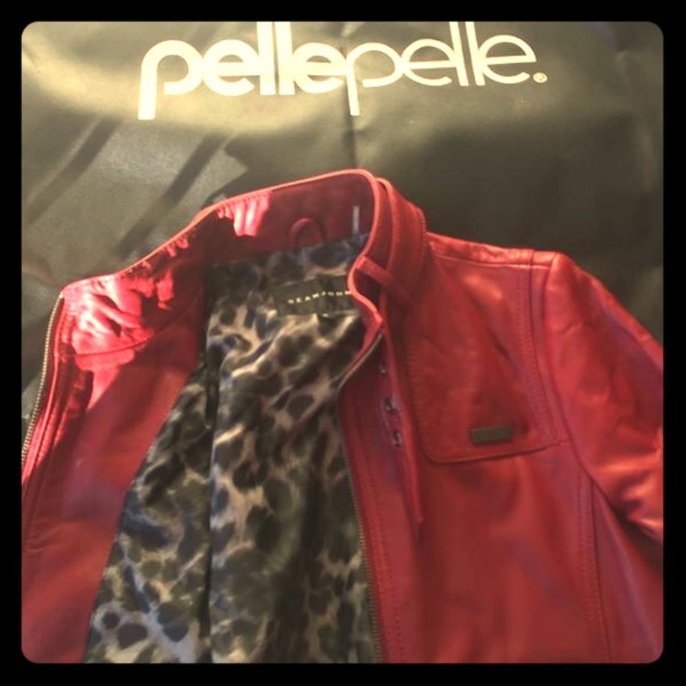 Red Leather jacket, never worn, bought in NYC. Med