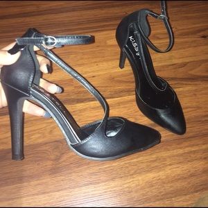 black pointed heels
