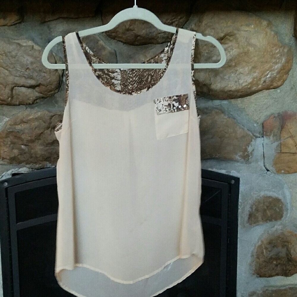 Cream color blouse with animal print accent