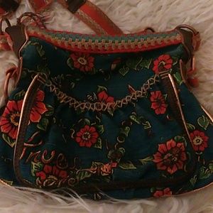 "Sakroots crossbody purse"