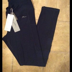 X by Gottex leggings with mesh cutouts