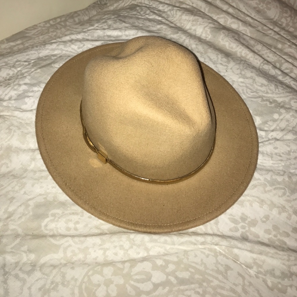 *Never worn* Tan women's Bebe hat.