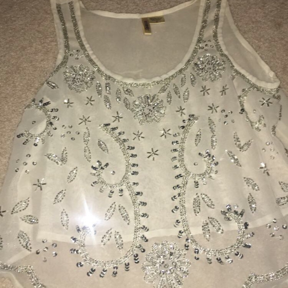 Very cute sheer bling tank top. Size-small
