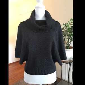 Cowl neck sweater.