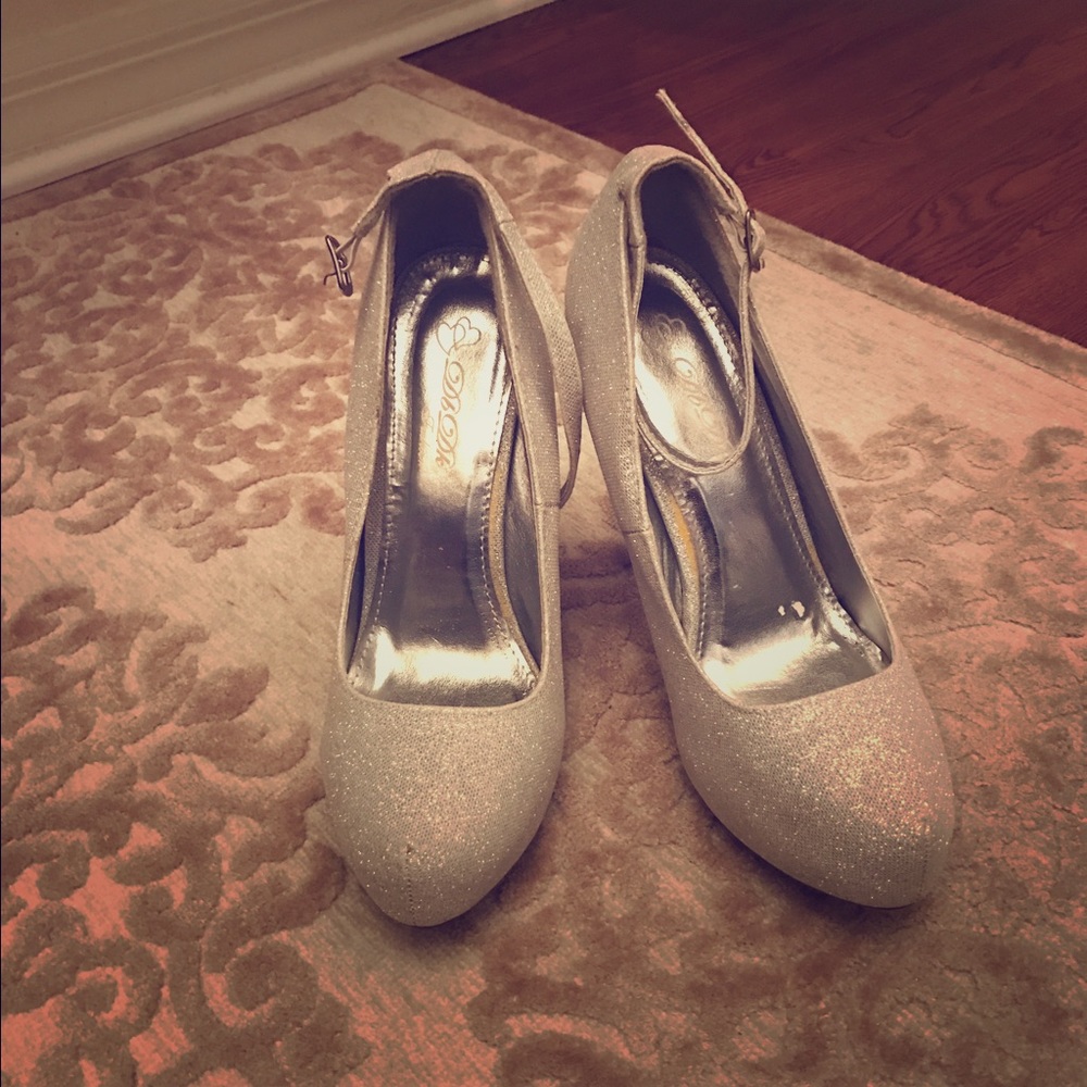 Silver closed toed heels