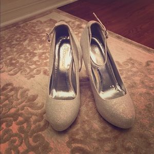 Silver closed toed heels