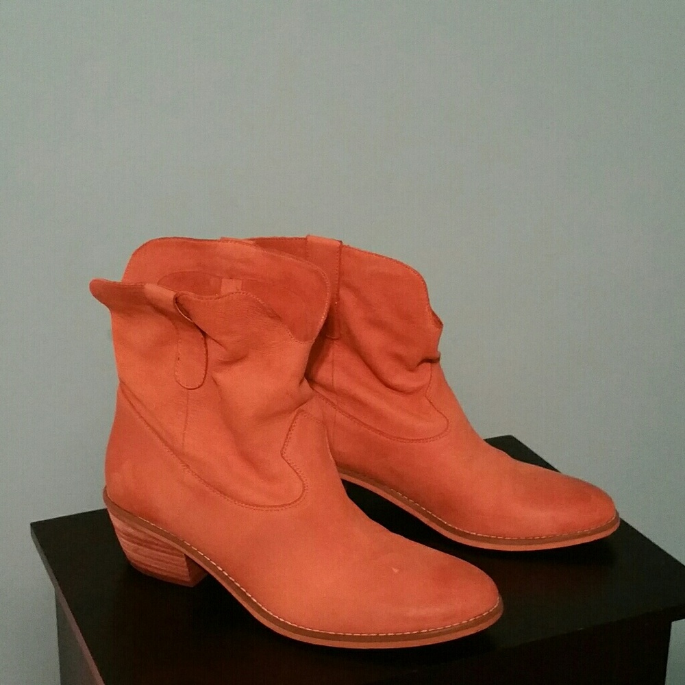 Brown suede in cowboy boots