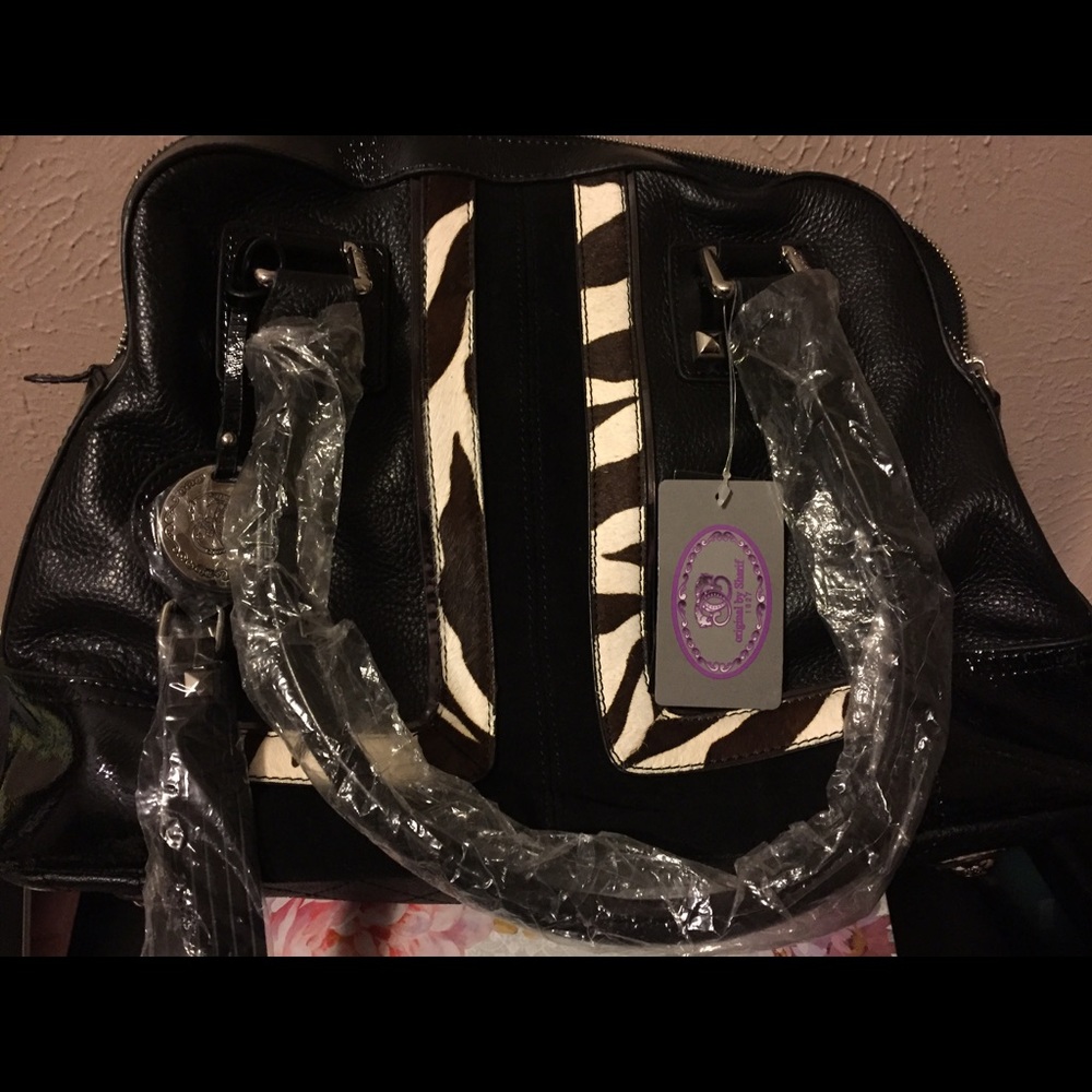 Authentic and NEW- Sharif satchel