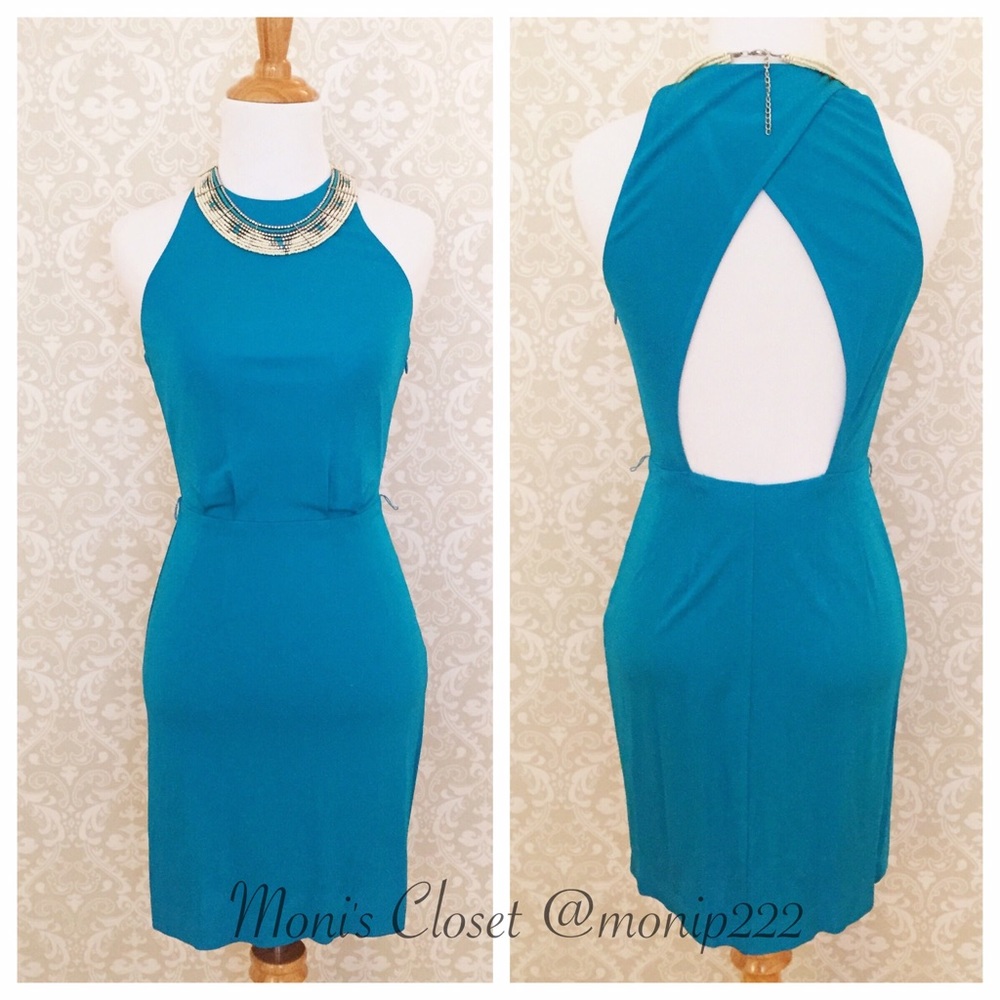 SOLD Bebe teal open back party dress