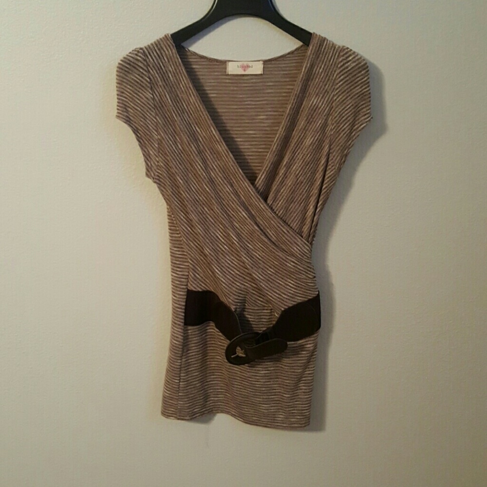 Brown shirt.