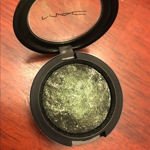 Mac mineralize eyeshadow in "smutty green."