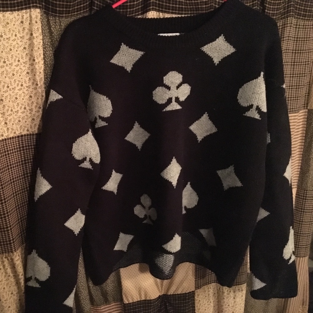 Sweater black and white Kling fits like a Medium