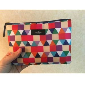 Kate Spade manufactured travel bag