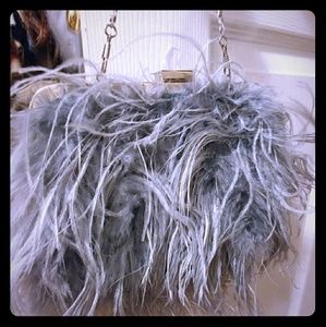 The Limited feather clutch